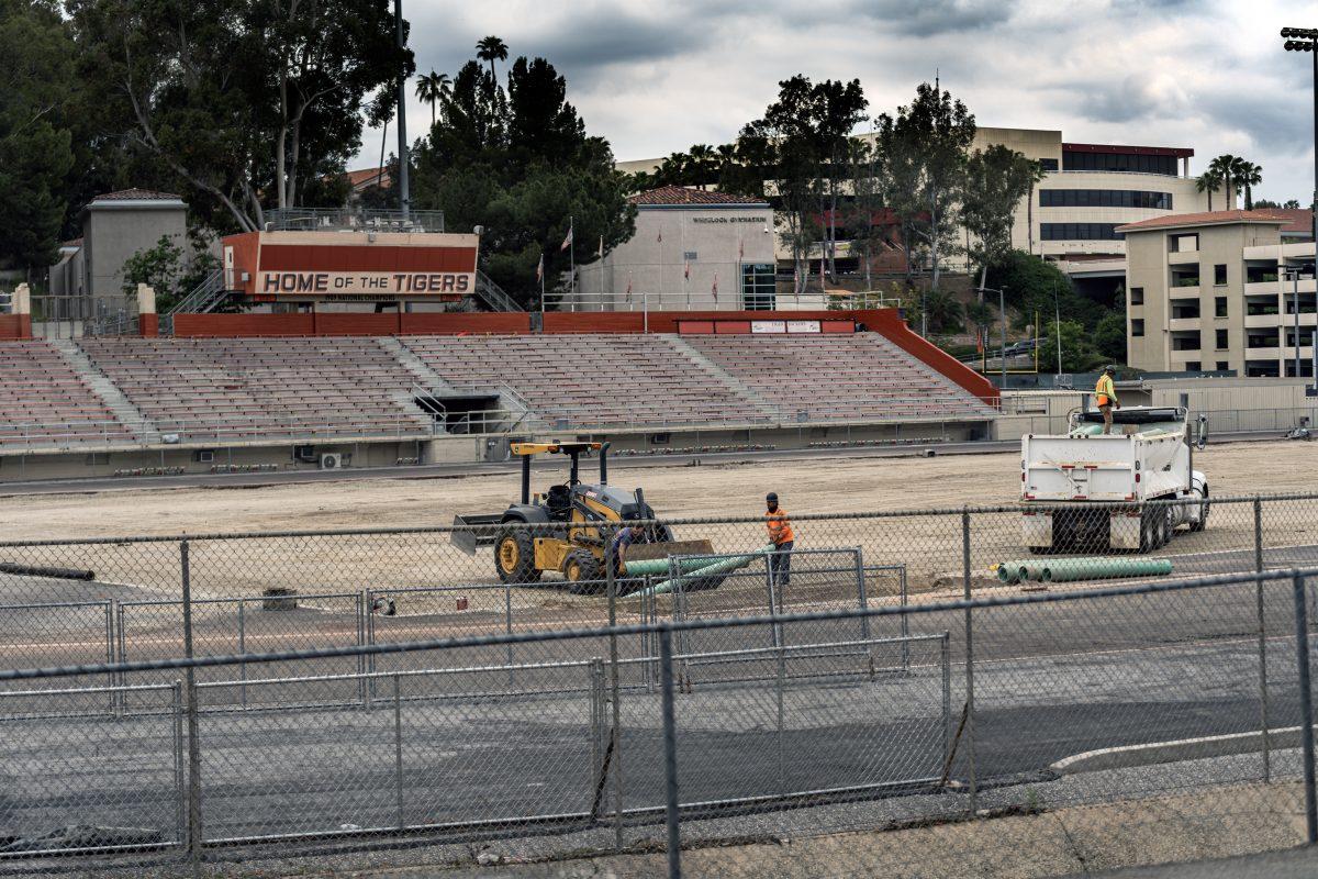 Workers continue the refurbishment of Wheelock Stadium track and field on May 10, at RIverside City College.

Photo by Stephen Day, Viewpoints.