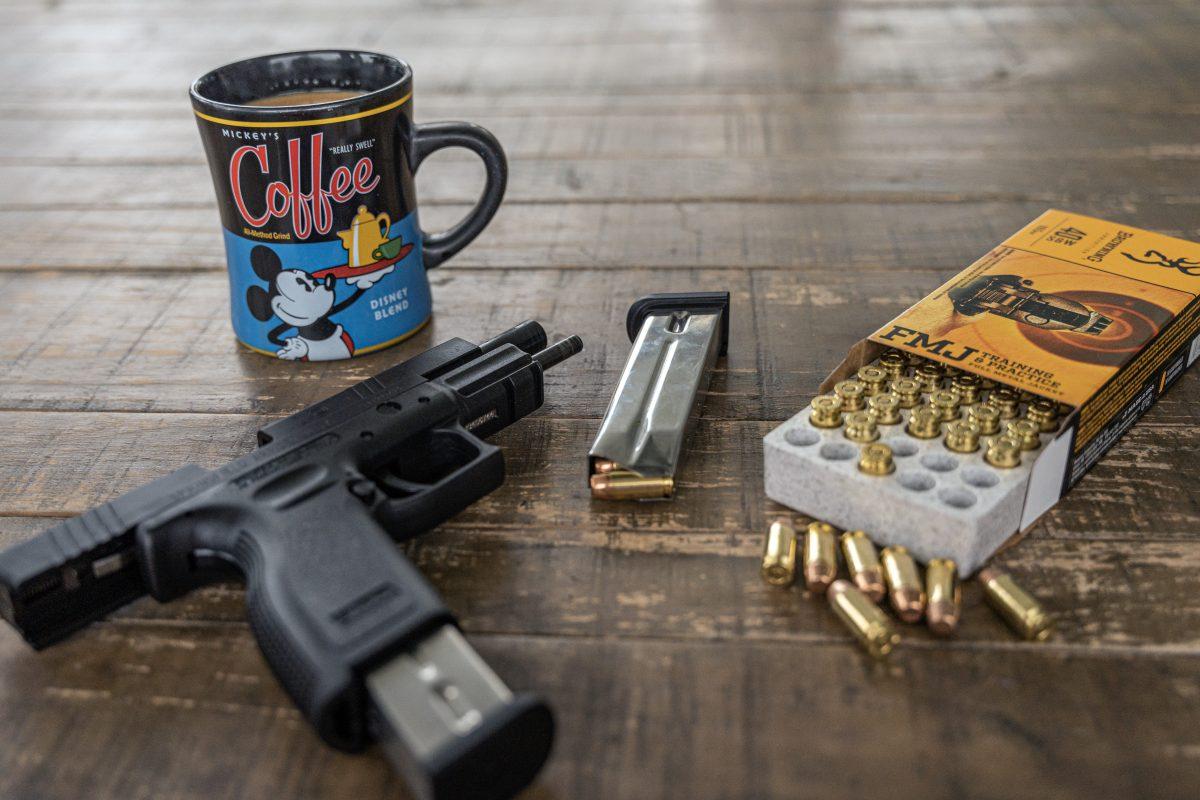 A Springfield Armory XD .40 caliber handgun sits on a table while an extra magazine is loaded in Riverside Ca on May 24.

Photo by Stephen Day, Viewpoints.