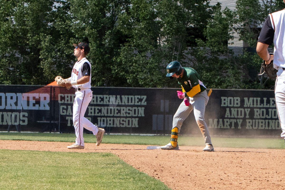 A Grossmont College player celebrates being safe while adding onto the blowout of RCC. The Tigers lost 14-3 in the first game of the playoffs. Photo by Mathew Acosta, Viewpoints.