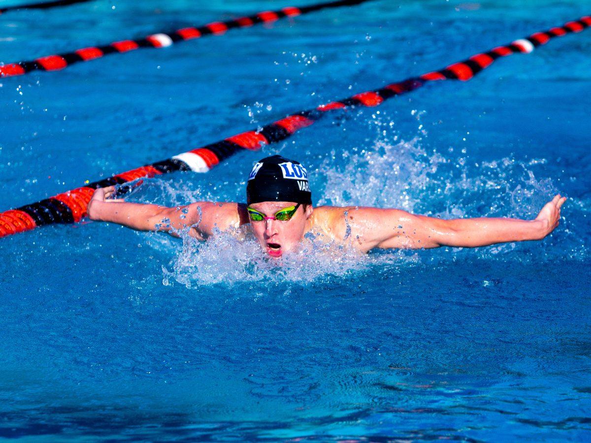 A high school swimmer competes in the butterfly stroke event at the CIF-SS championships. Photo by Mathew Acosta, Viewpoints.