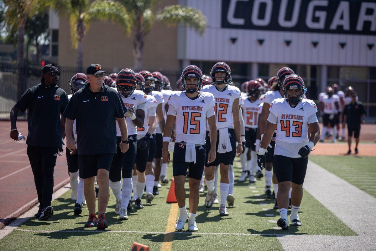 Riverside City College Tigers entering the gridion to do battle against the Palomar College Comets before the game at Wilson Stadium in Escondido, Ca on Sept 23.
 Photo by Bobby R. Hester