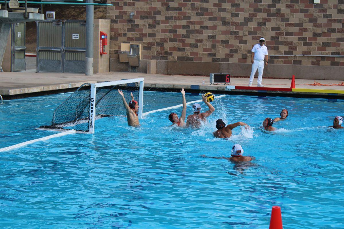 Sophomore Goalie Nathan Dulkis and Sophomore Defender Kevin Mora looking to defend a goal during the Men's Alumni Water Polo Game at the RAC on Sept. 1. (Jesus Coronel | Viewpoints)