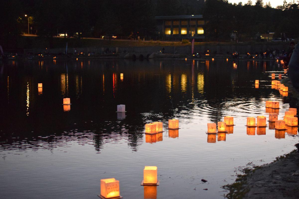 Lanterns light up the water at The Water Lantern Festival at Lake Gregory Regional Park in Crestline CA on Oct 1. (Caitlyn Nelson | Viewpoints)