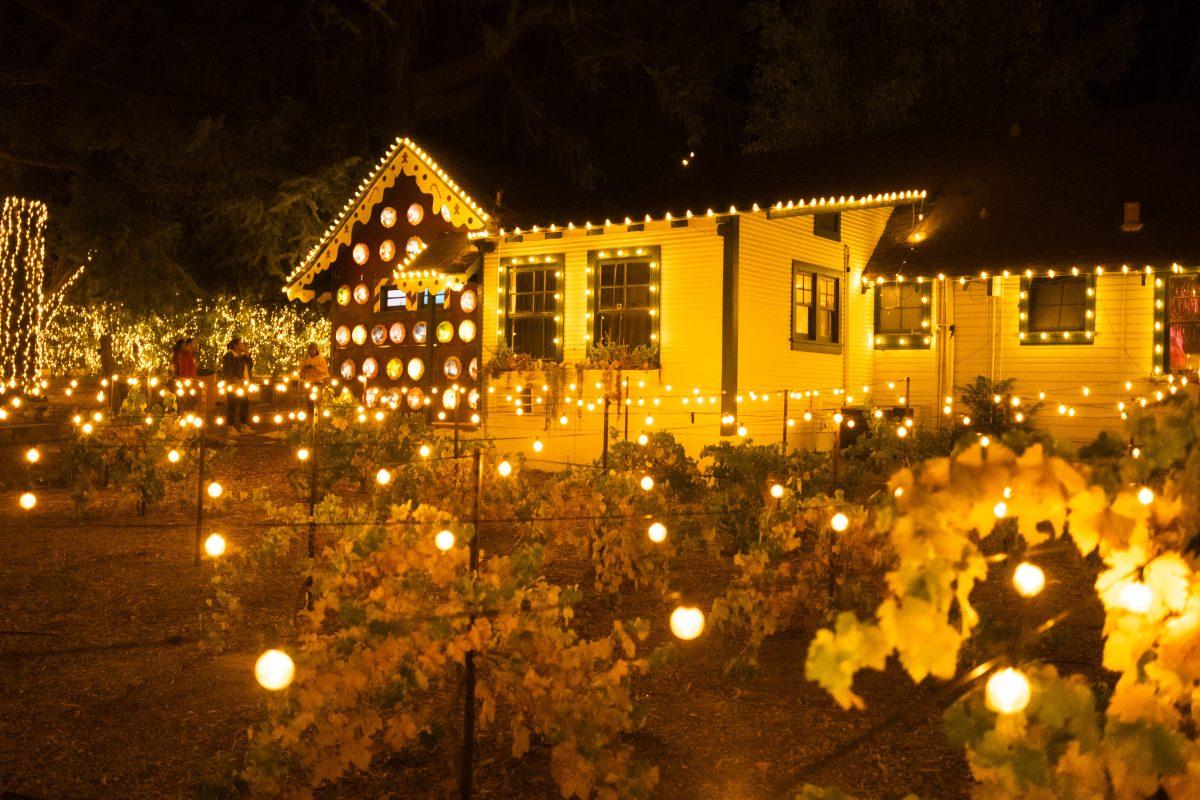 Cottages decorated with lights, during opening weekend at 123 Farm, on Nov. 11. 