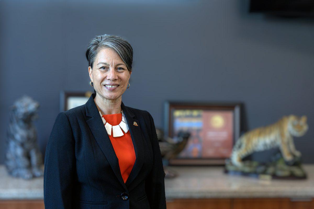 Dr. Claire Oliveros, new president of Riverside City College, stands in her office adorned with tiger related decorations on Oct 26 in the Dr. Charles A. Kane Student Services and Administration Building.

(Stephen Day | Viewpoints)