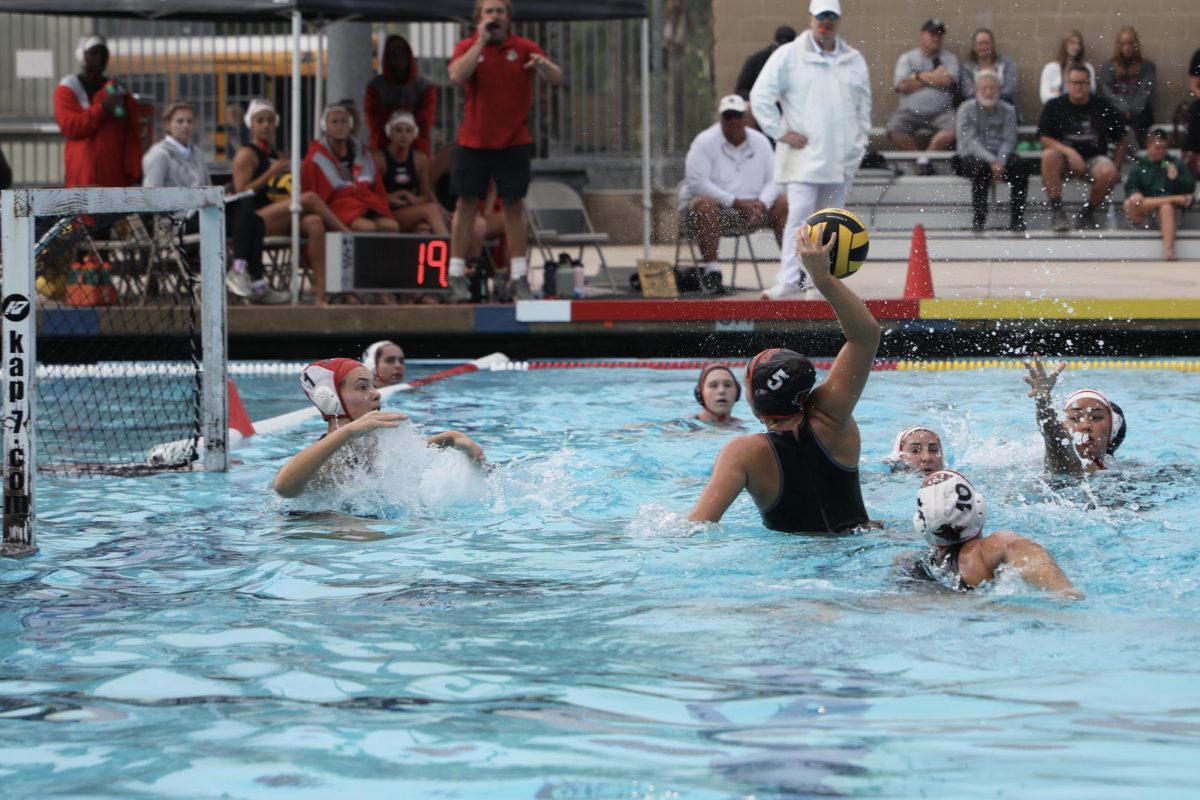 Riverside City College attacker Samantha Thomas prepares to make a goal against Santa Barbara goalie Kate Densmore with 19 seconds left on the timer.