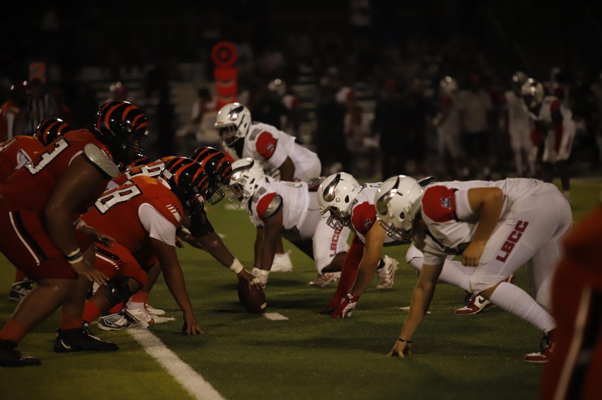 Riverside City College Football offensive line gets ready to snap the football at Wheelock Stadium on Sept.7