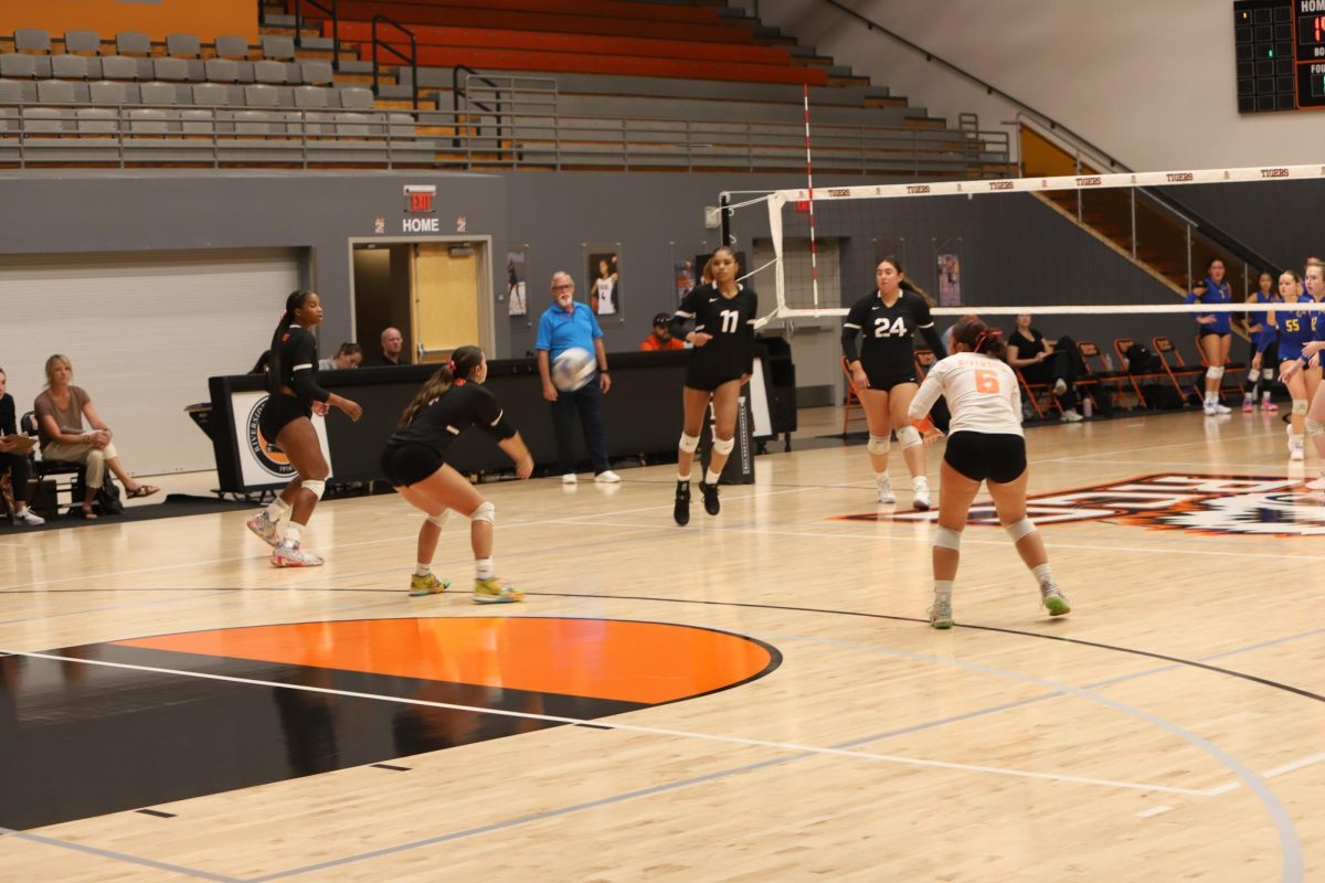 Riverside City College freshman libero Keira Isgar hits the ball as her teammates look on at the Wheelock Gymnasium on Oct. 2. 