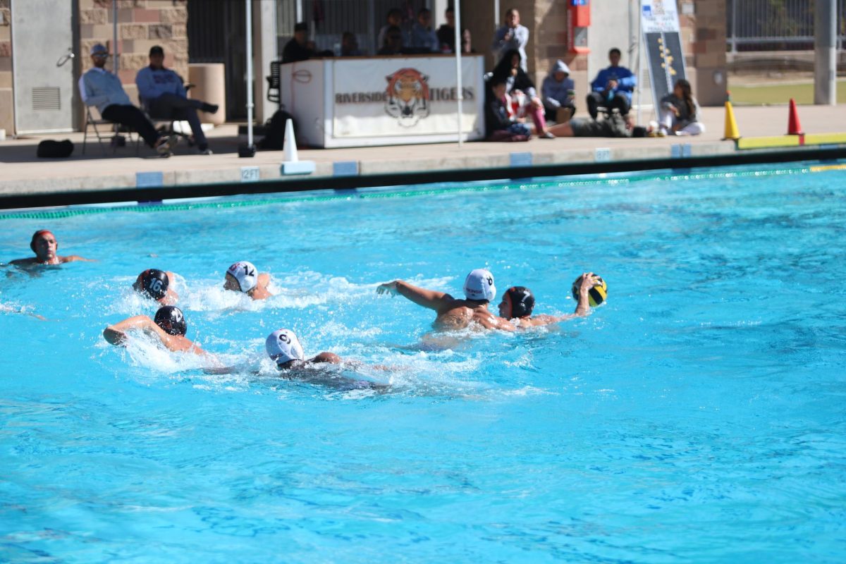 Colby Martin holds off Viking's defender as teammates get in position on Oct. 18.