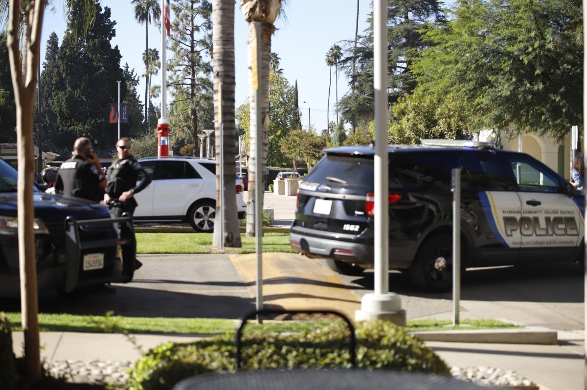 Early morning on Oct. 23, police vehicles block Fairfax Ave. near the Math and Science Building, monitoring the scene where a student reportedly fell. 