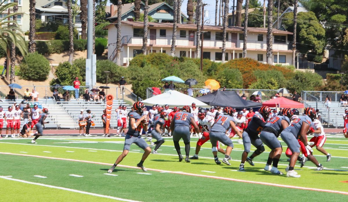 Brady Jones #12 drops back to pass against Mt. San Jacinto College Oct. 5.