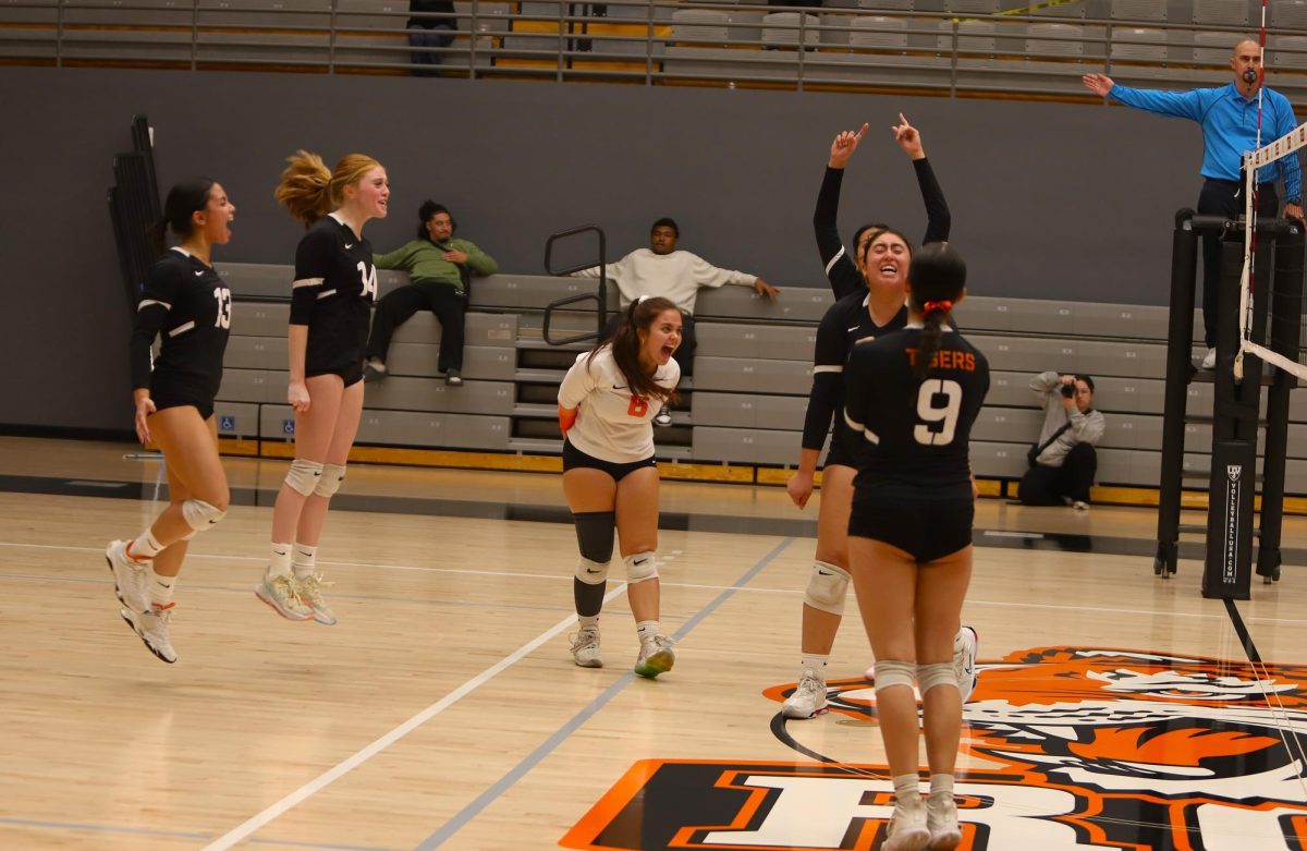 Riverside City College volleyball celebrates after winning a set against the Golden West Rustlers at Wheelock Gymnasium Nov. 15.