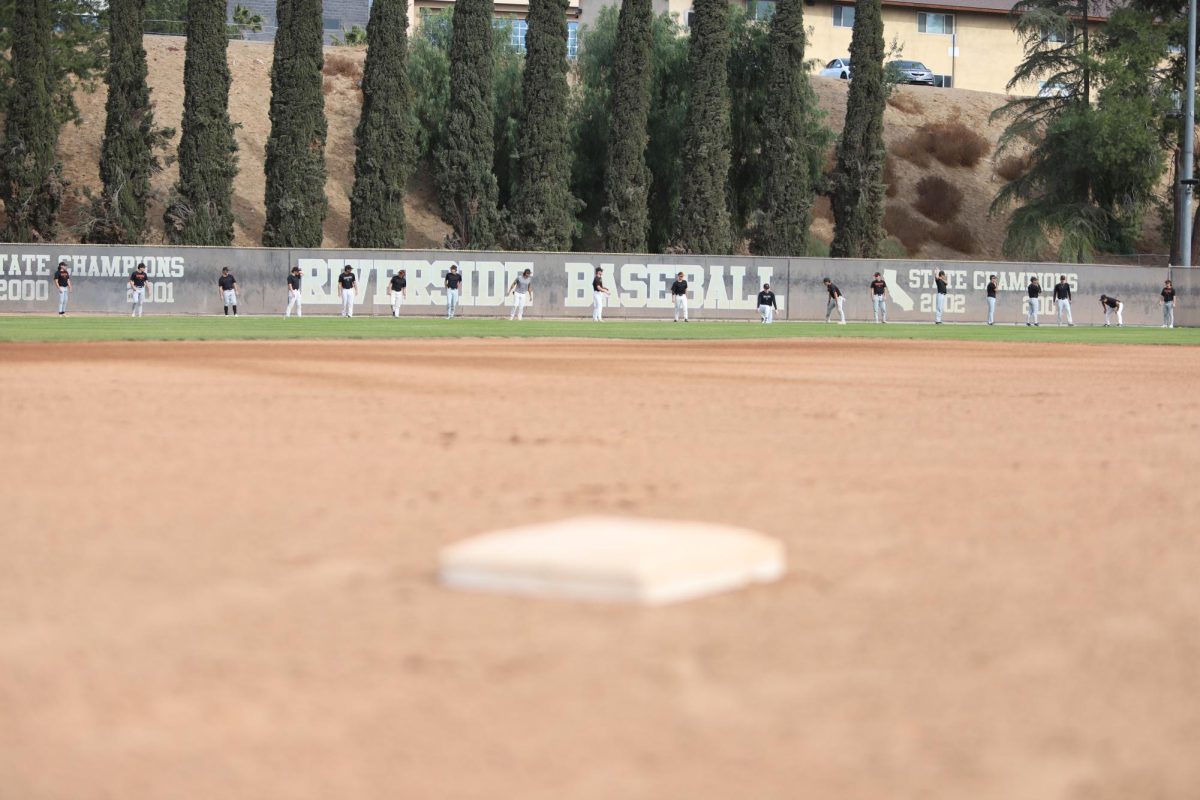 Riverside City College players warm up in the outfield at Evans Sports Complex Jan. 22.