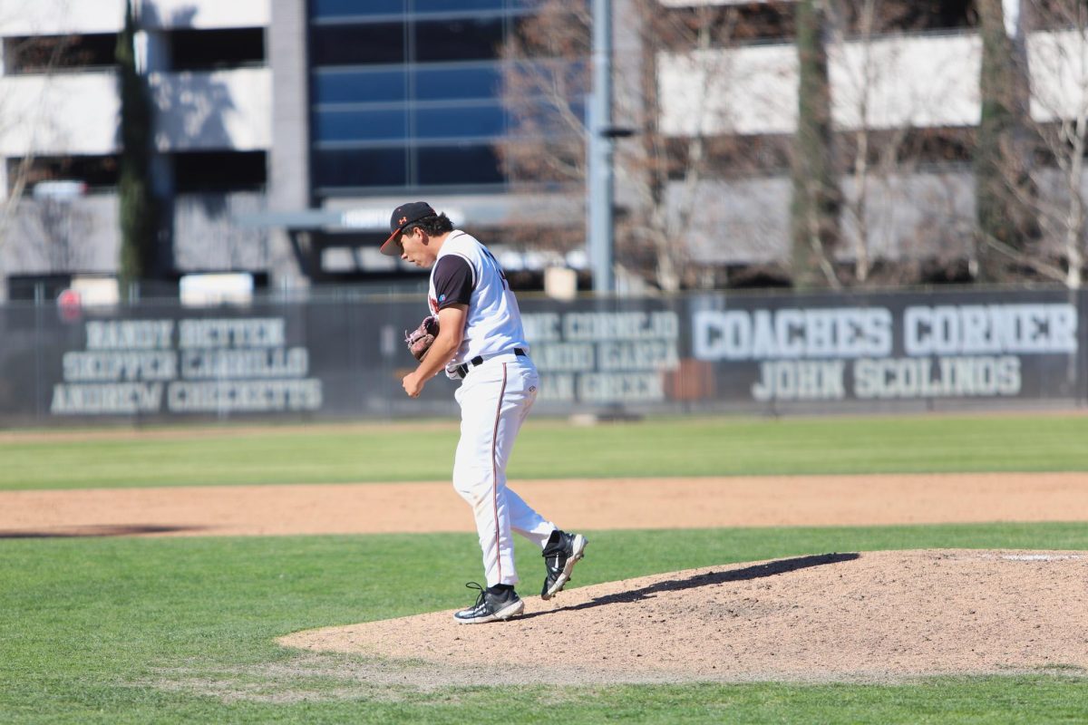 Riverside City College pitcher Jorge Rodriguez, 14, gets fired up after escaping a jam against Palomar College at Evans Sports Complex Feb. 21.