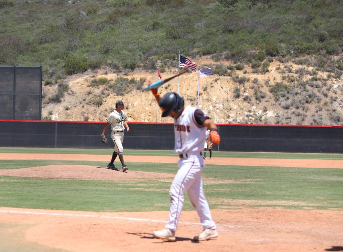 Riverside City College hitter Marcus Moyer strikes out to end the Tigers' season as Palomar College celebrates advancing to the 3C2A regional finals at Bob Vetter Field on May 10. 