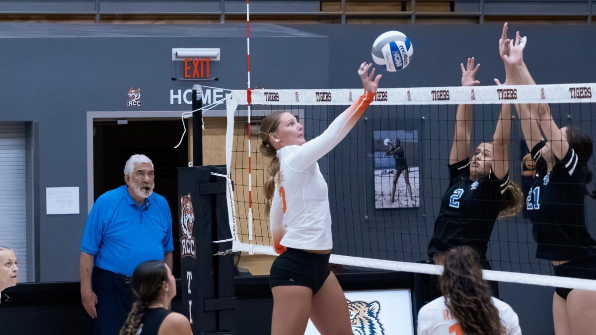Riverside City College volleyball Jayden Franchere #10 tipping the ball to Mt. San Antonio defenders on Sept. 12. 