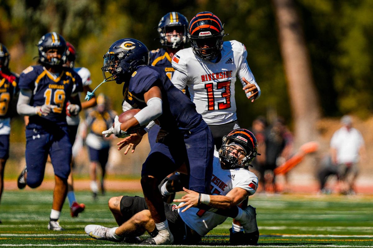 Riverside City College defensive back Donald Smith III #4 tackling running back Isaiah Rameau #9 at Cougar Stadium, Sept. 13. By Dylan Stewart
