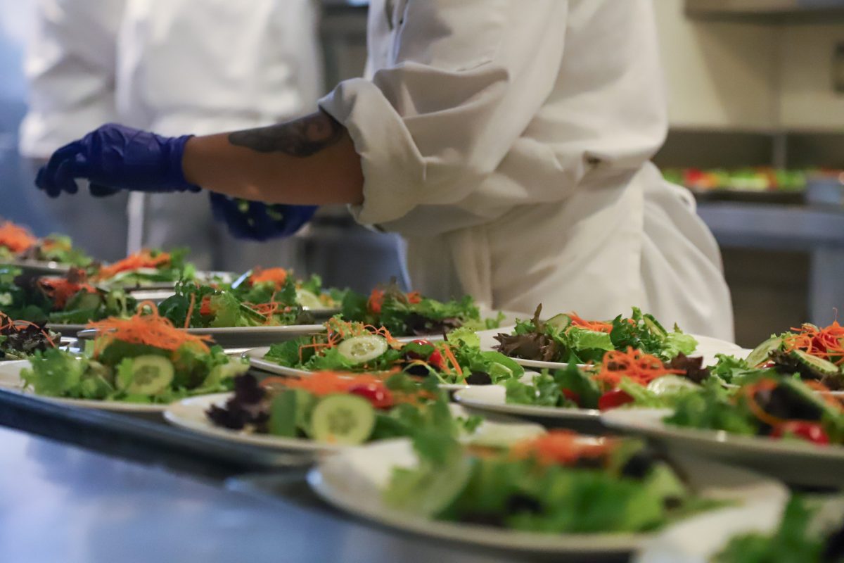 Students at the culinary program at Riverside City College set up lunch on Oct. 16.