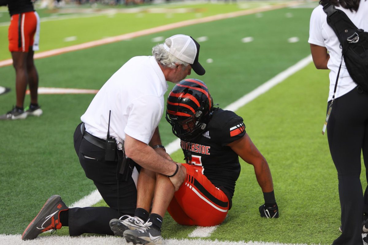 Riverside City College athletic trainer tending to athlete (2024-2025 Season).
