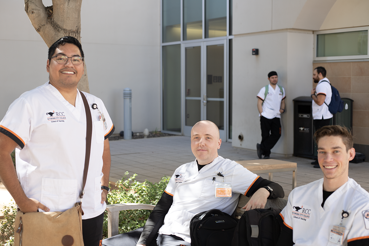 Israel Marin, Jeremy Stewart, and Zachary Bush all Nursing majors hanging outside the School of Nursing building on Friday, October 17th.