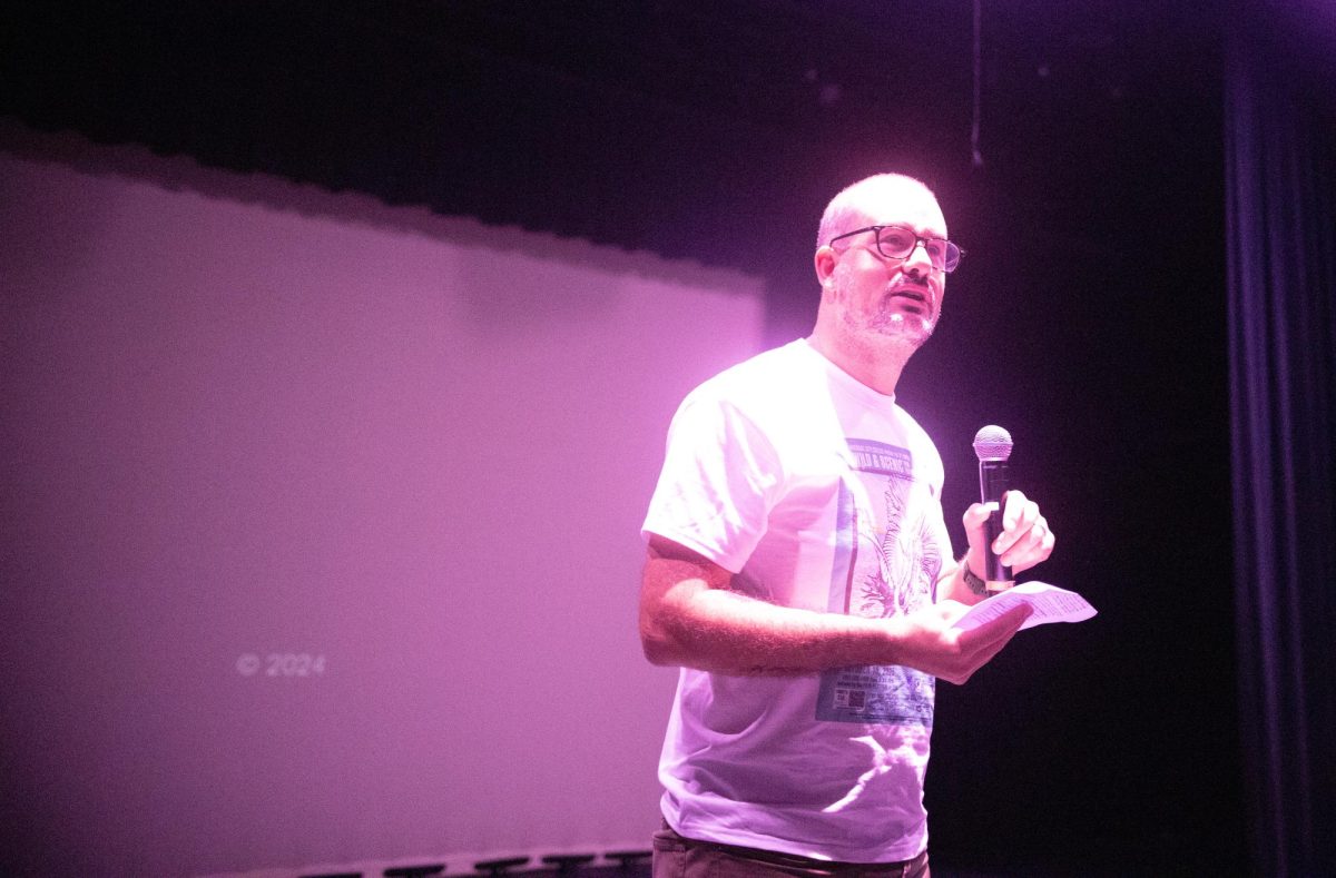 Greg Russell, co-advisor of the Student Sustainability Collective, giving a speech to the crowd during the 3rd annual Wild and Scenic Film Festival at The Box Theater on Oct. 10.