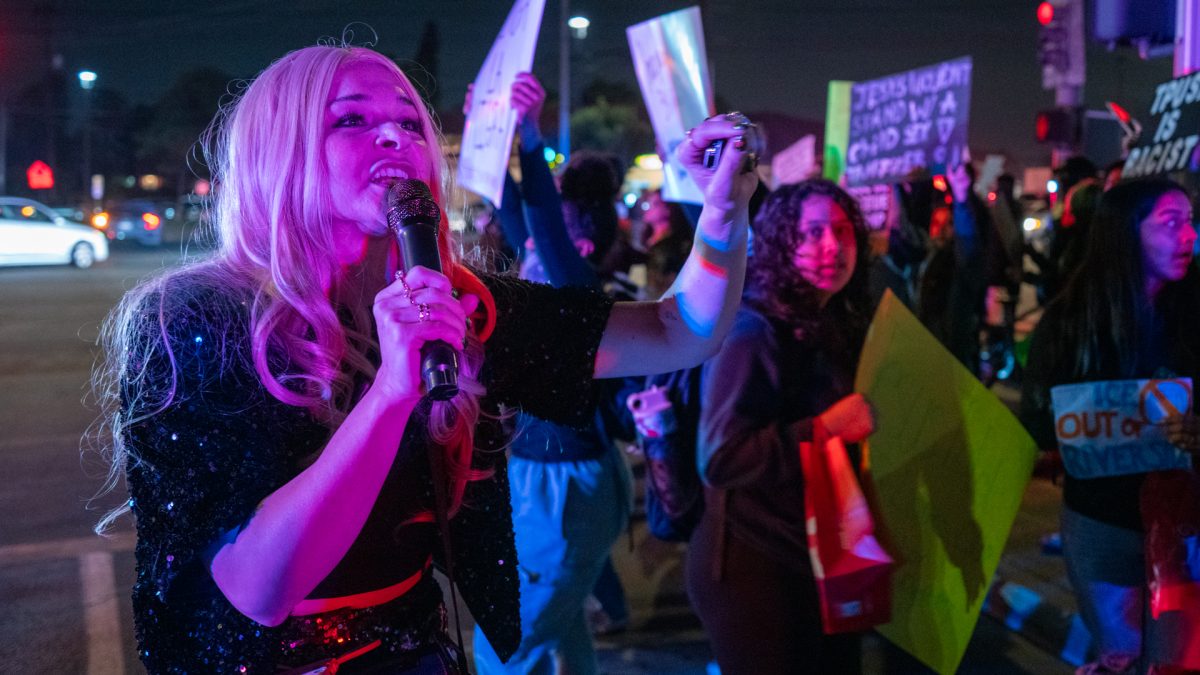 "Give me your money," said Chelsea Gods, Erika Kirk impersonator, as she stands in front of Harvest Church in protest of Erika Kirk's guest appearance for the "Make Heaven Crowded" tour on Jan. 21, 2026.