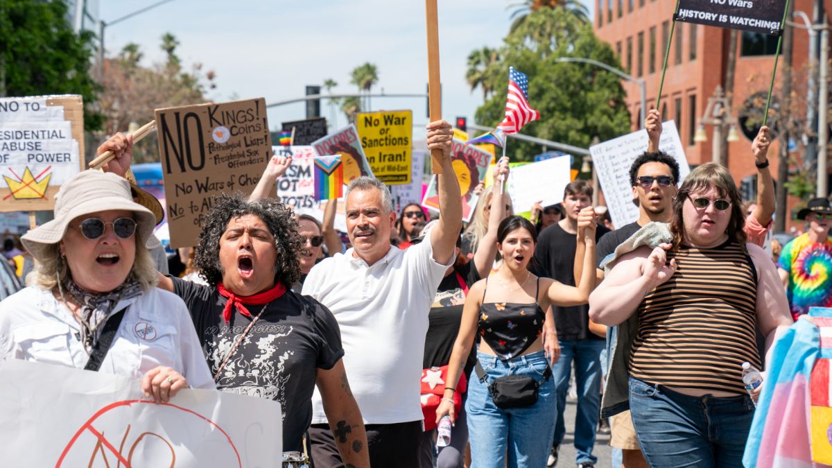 Attendees took to the streets of downtown Riverside shortly after the “No Kings” demonstration on March 28, to continue their support for the anti-fascist ideals presented at the rally.