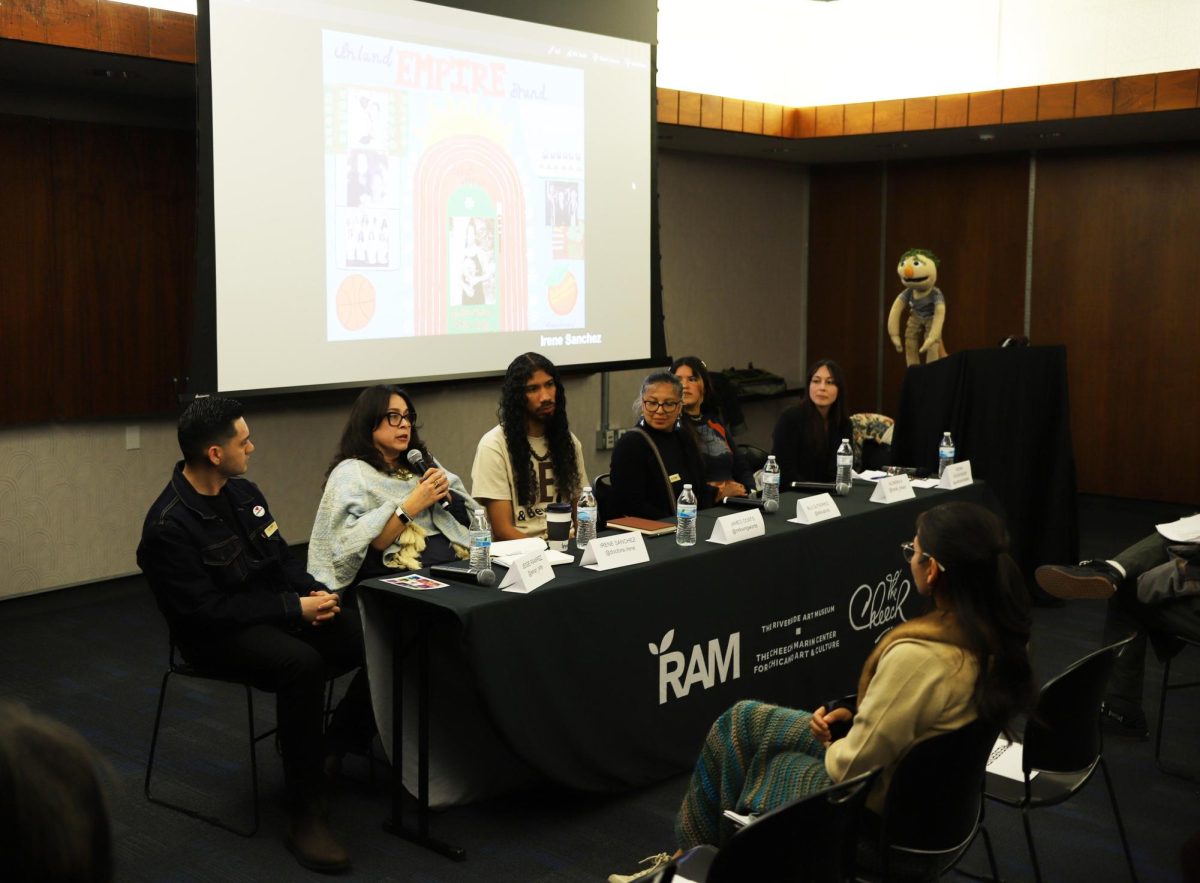 Irene Sanchez speaks at the artist talk for the "Black and Brown in the Inland Empire and Beyond" exhibit on March 5.