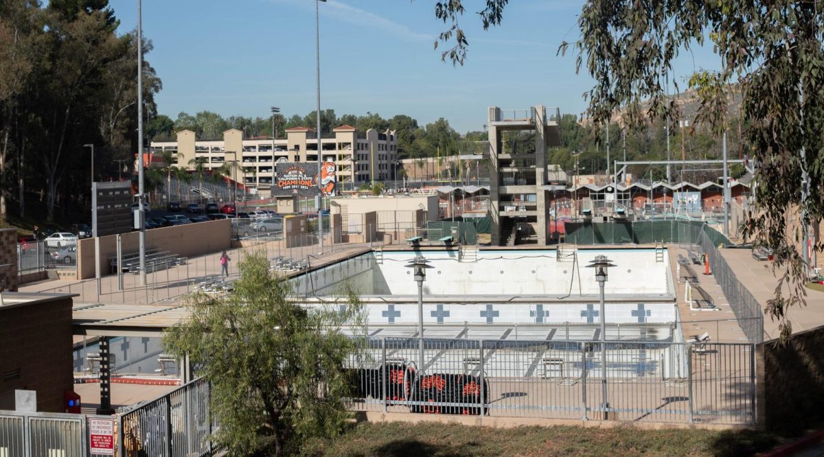 The Olympic Pool at the Riverside Aquatics Complex is fenced off to prevent access after Riverside City College found major leaks and damage to the pool and deck. 
