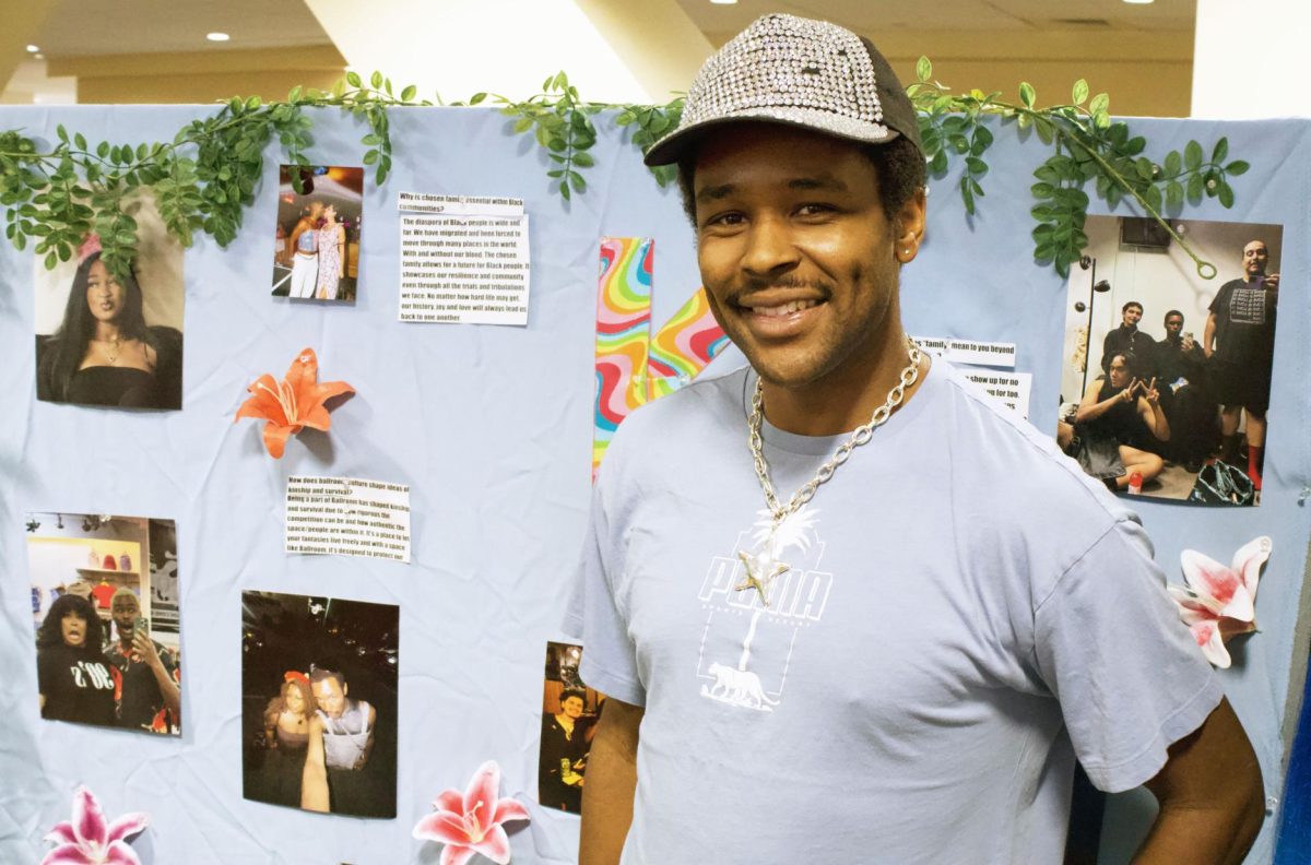 Riverside City College student Sabree Gilkes curator for the "B.L.A.C.K" exhibit.