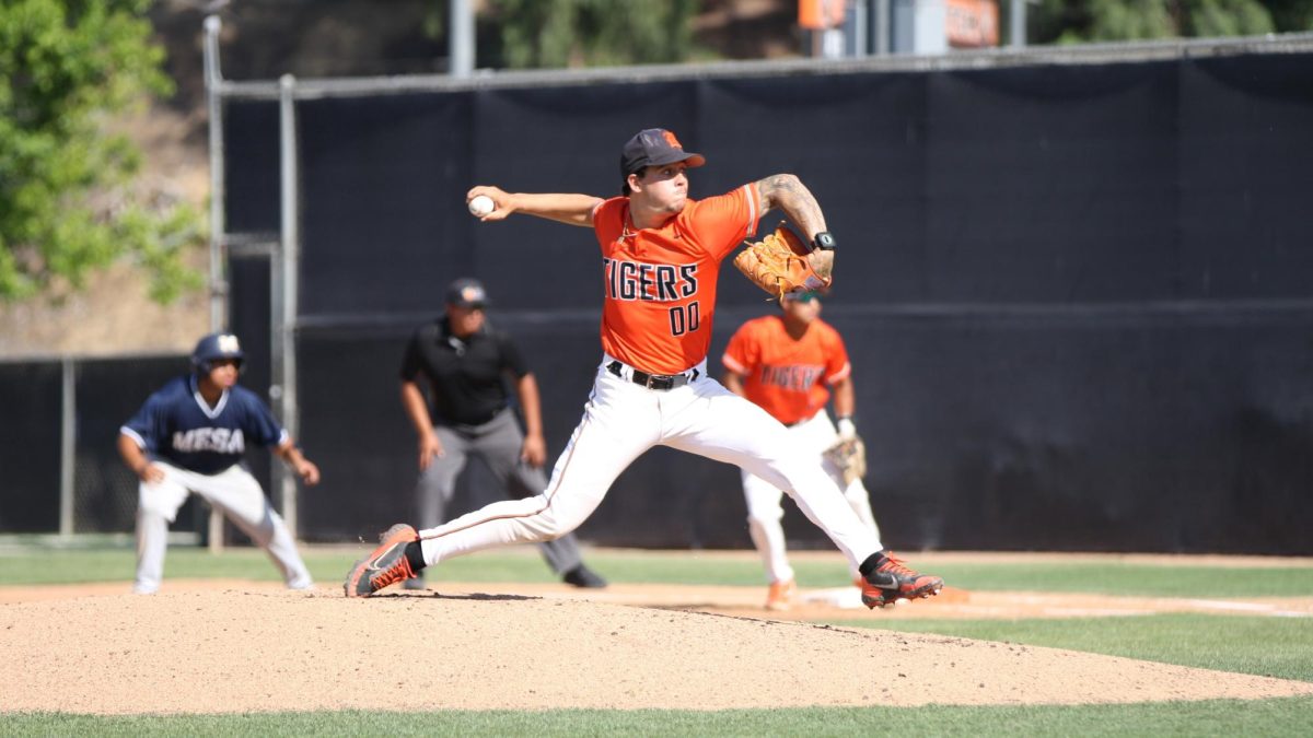 Tiger's and Orange Empire Conference pitcher of the year Jake Valenzuela delivers a pitch against San Diego Mesa on May 1.