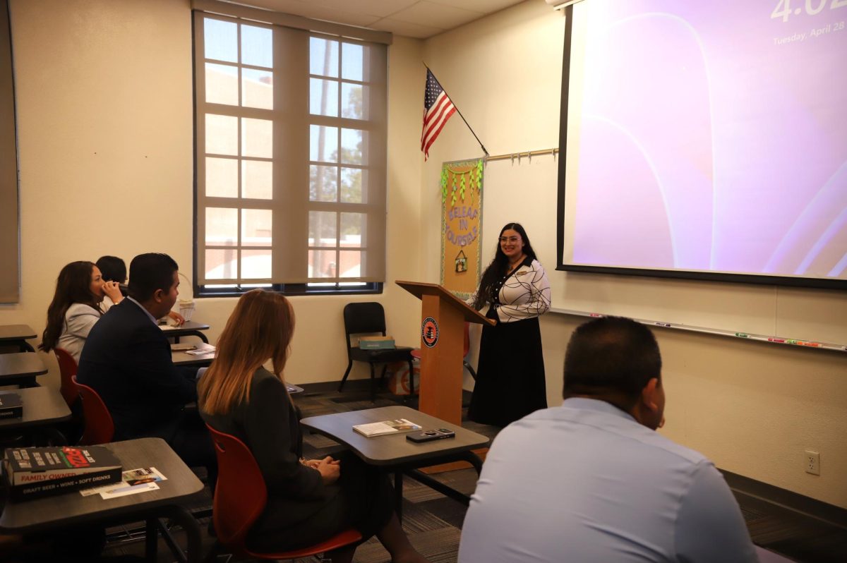 Adela Gonzales secretary for the Students in Politics club speaks at the first forum of the 'Candidate Series' on April 28.